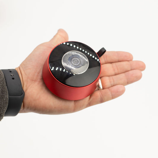 Mini speaker with red Mandela lighting effect