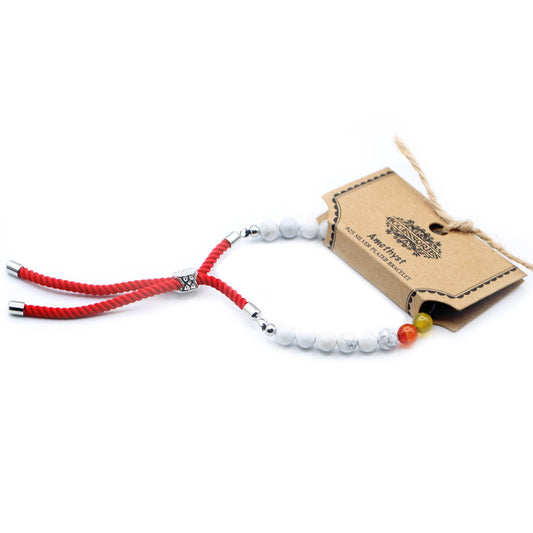Red thread bracelet with white Khaulita and Chakras