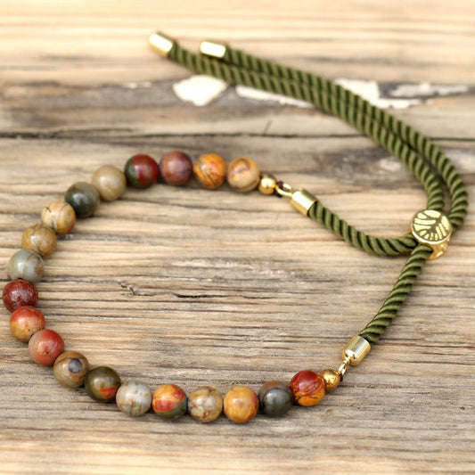 Green string bracelet with multicolor Jasper