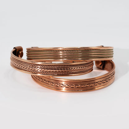 Pulseras con diseño de bandas de cobre e imanes (surtidas)